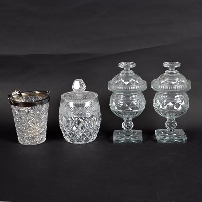 Lot 153 - A pair of cut glass confitures and covers on...