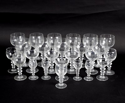 Lot 155 - A part glass table service with double knopped...