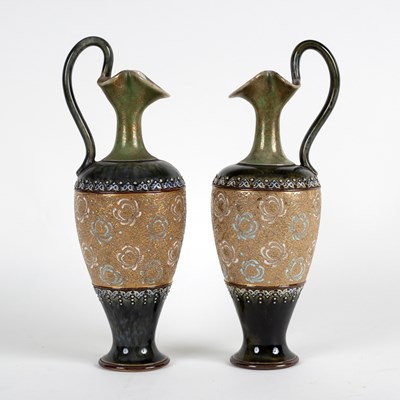 Lot 164 - A pair of Royal Doulton stoneware ewers, green...