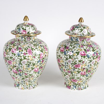 Lot 199 - A pair Crown Staffordshire jars and covers...