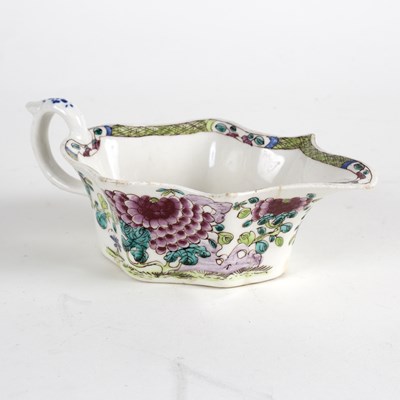 Lot 214 - A Bow porcelain sauceboat, circa 1750-54, of...