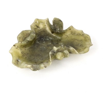 Lot 233 - A Chinese jade leaf-shaped dish with bud to...