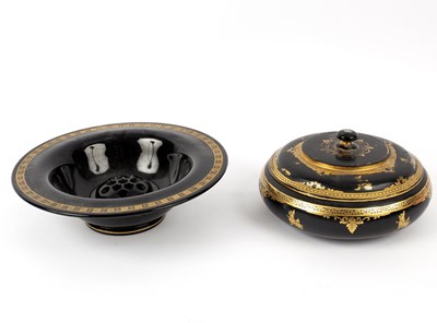 Lot 235 - An Oriental black and gold lacquer circular...