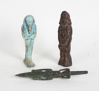 Lot 262 - An Egyptian turquoise ushabti, a candle column...