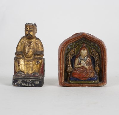 Lot 267 - An Indian Buddha, gilded and a smaller figure...