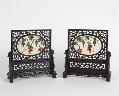 Lot 281 - A pair of Chinese table screens each with oval...