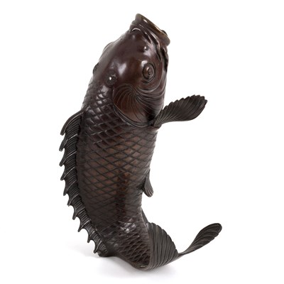 Lot 292 - A Japanese bronze model of a leaping fish,...