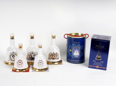 Lot 320 - Seven Bell's Whisky commemorative decanters,...