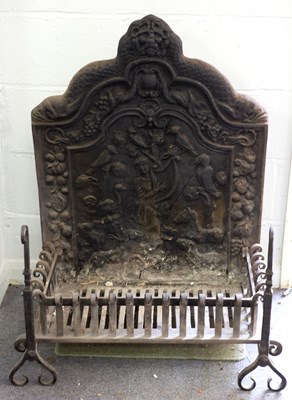 Lot 371 - A cast iron fire back decorated Orpheus...