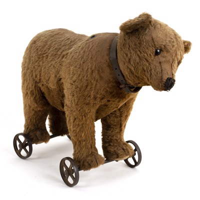 Lot 372 - A Steiff bear on wheels, circa 1909, with...