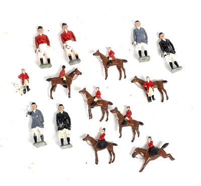 Lot 374 - Fourteen painted tin toy hunting figures