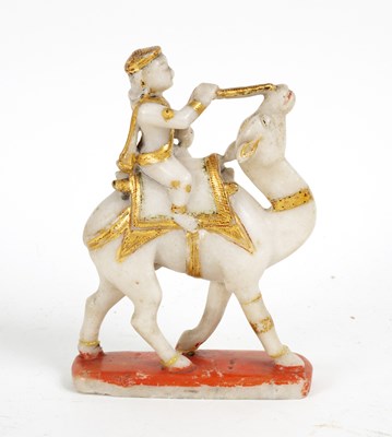 Lot 386 - An Indian carved alabaster and gilt figure on...