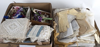 Lot 402 - A box of lace edging, place mats, paper and...