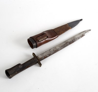 Lot 421 - A Victorian folding bayonet, operated by oval...