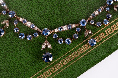 Lot 121 - An Edwardian yellow gold, diamond and sapphire collarette necklace
