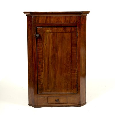 Lot 616 - A 19th Century mahogany corner cupboard with...