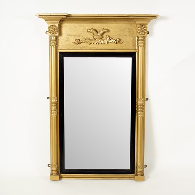 Lot 622 - A Regency giltwood wall mirror with eagle...