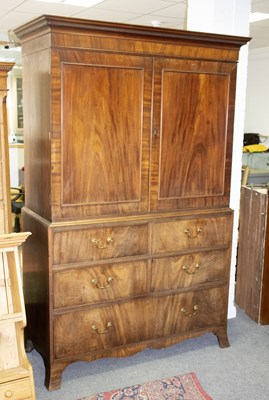 Lot 625 - A 19th Century mahogany linen press adapted...