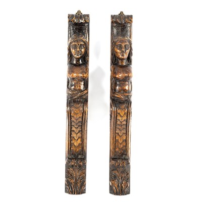 Lot 655 - A pair of oak caryatid supports, 61.5cm high