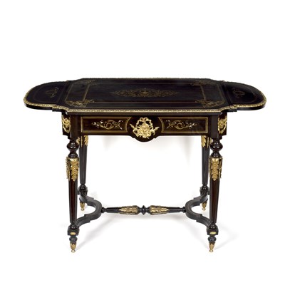 Lot 666 - A French ebonised and gilt metal mounted table,...