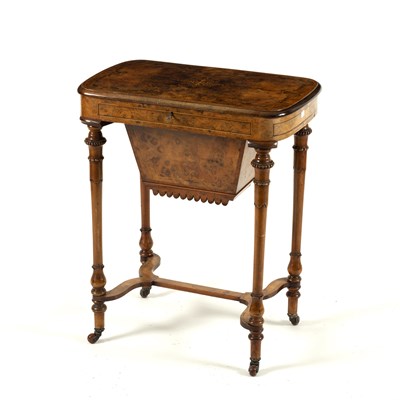 Lot 667 - A Victorian walnut work table with inlaid top,...