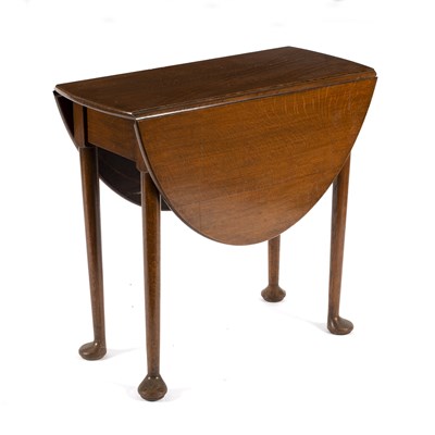 Lot 668 - An oak two-flap table, the oval top on turned...