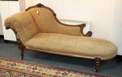 Lot 674 - A Victorian carved walnut framed chaise longue,...