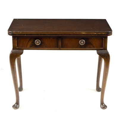 Lot 679 - A mid 20th Century mahogany folding tea table...