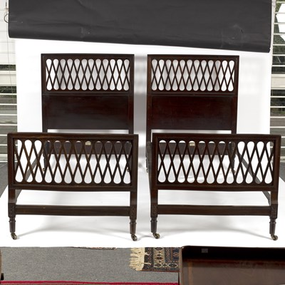 Lot 696 - A pair of Heal & Son mahogany single beds,...