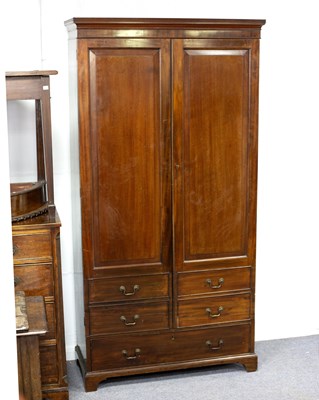 Lot 707 - A George II style mahogany wardrobe, with two...