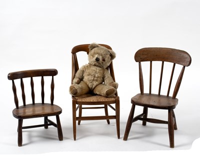 Lot 730 - Three children's chairs and a teddy...