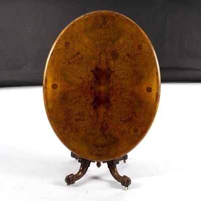 Lot 738 - A Victorian walnut and inlaid breakfast table,...