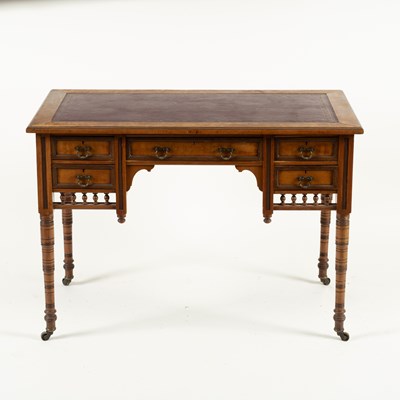 Lot 740 - An Edwardian walnut writing table, Jas...