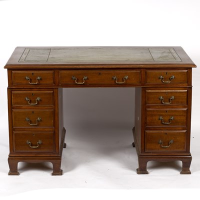 Lot 746 - A 20th Century walnut pedestal desk, fitted...