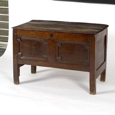 Lot 764 - A 17th Century oak coffer, the plank top above...