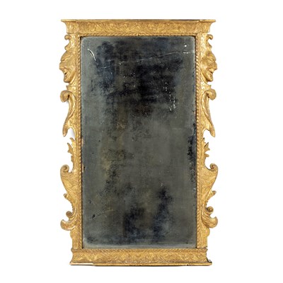 Lot 769 - A George I carved and gilded pier glass, the...