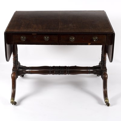 Lot 770 - A Regency mahogany sofa table, on turned end...