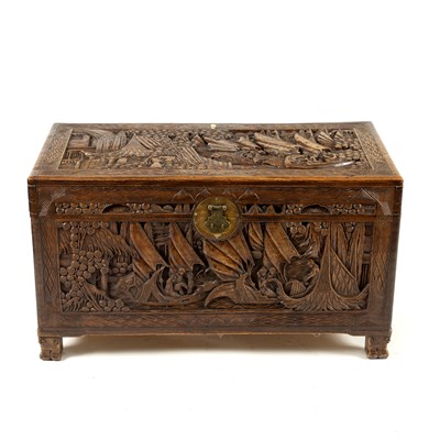 Lot 785 - An Oriental carved camphorwood chest, 104cm wide