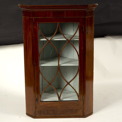 Lot 790 - A George III mahogany hanging corner cupboard