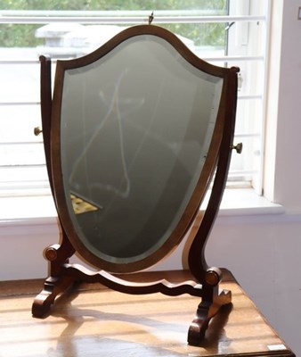 Lot 814 - A Victorian shield-shaped swing frame toilet...