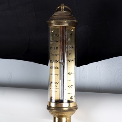 Lot 836 - A brass cased marine barometer with gimbals,...