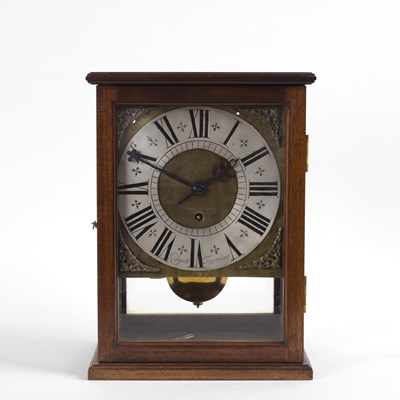 Lot 844 - A glass cased mantel clock, the square dial...