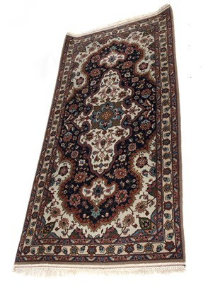 Lot 864 - An Isfahan rug, the central medallion to an...