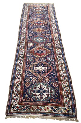 Lot 868 - A late 19th Century Caucasian Kazak runner,...