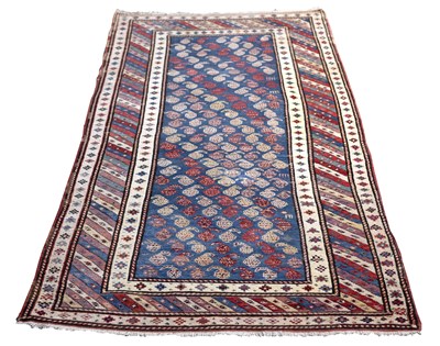 Lot 874 - A late 19th Century Kazak rug, 225cm x 110cm