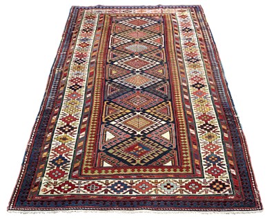 Lot 875 - A late 19th Century Kazak rug, 290cm x 112cm