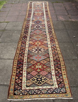 Lot 877 - A Veramin runner, West Persian circa 1910,...