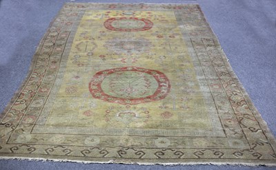 Lot 885 - A Khotan rug, East Turkestan, circa 1910,...