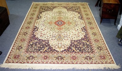 Lot 901 - A Turkish ivory ground rug, 274.5cm x 177cm