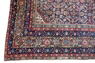 Lot 907 - A large Fereghan carpet, circa 1900, the blue...